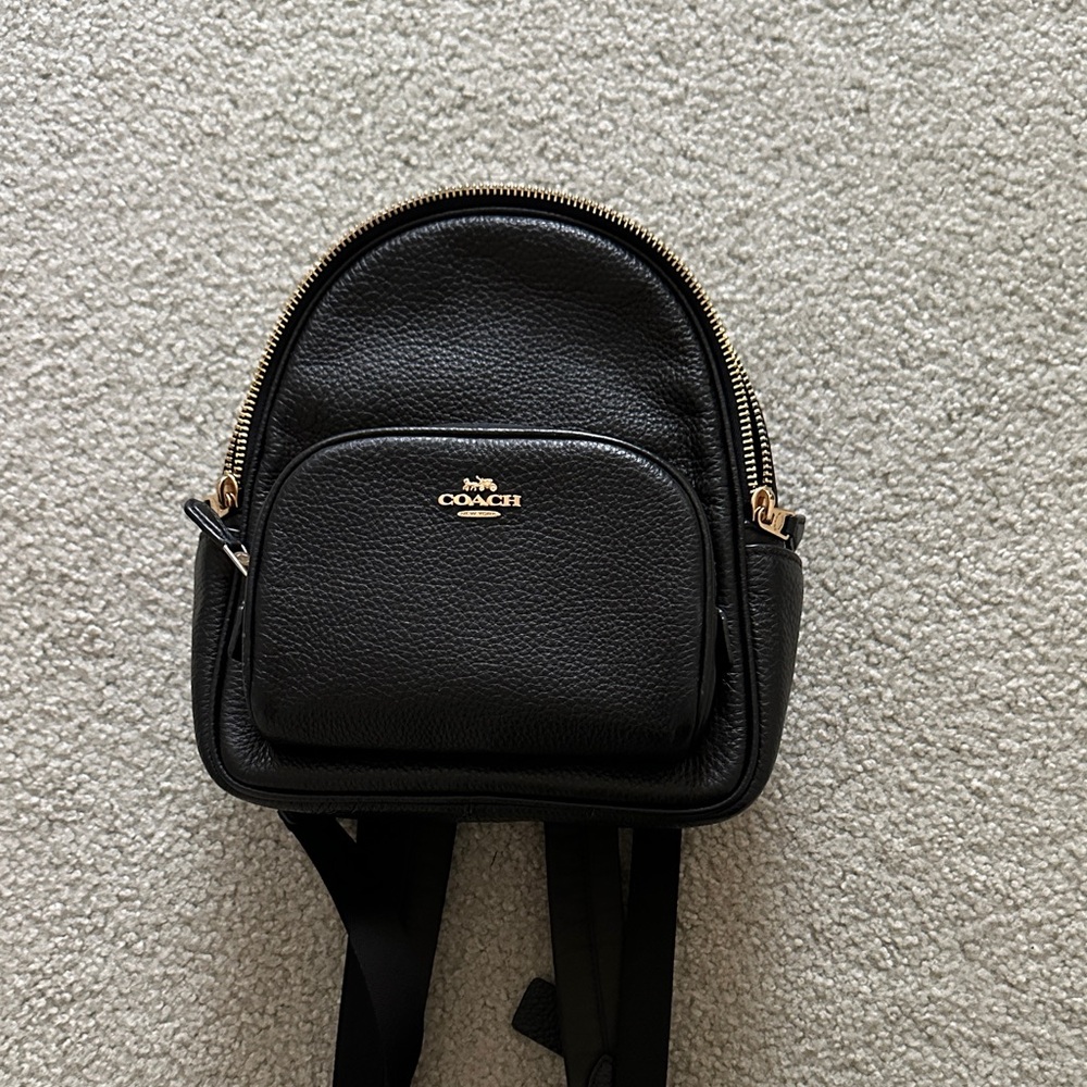 Coach Black Leather Backpack with Gold Details